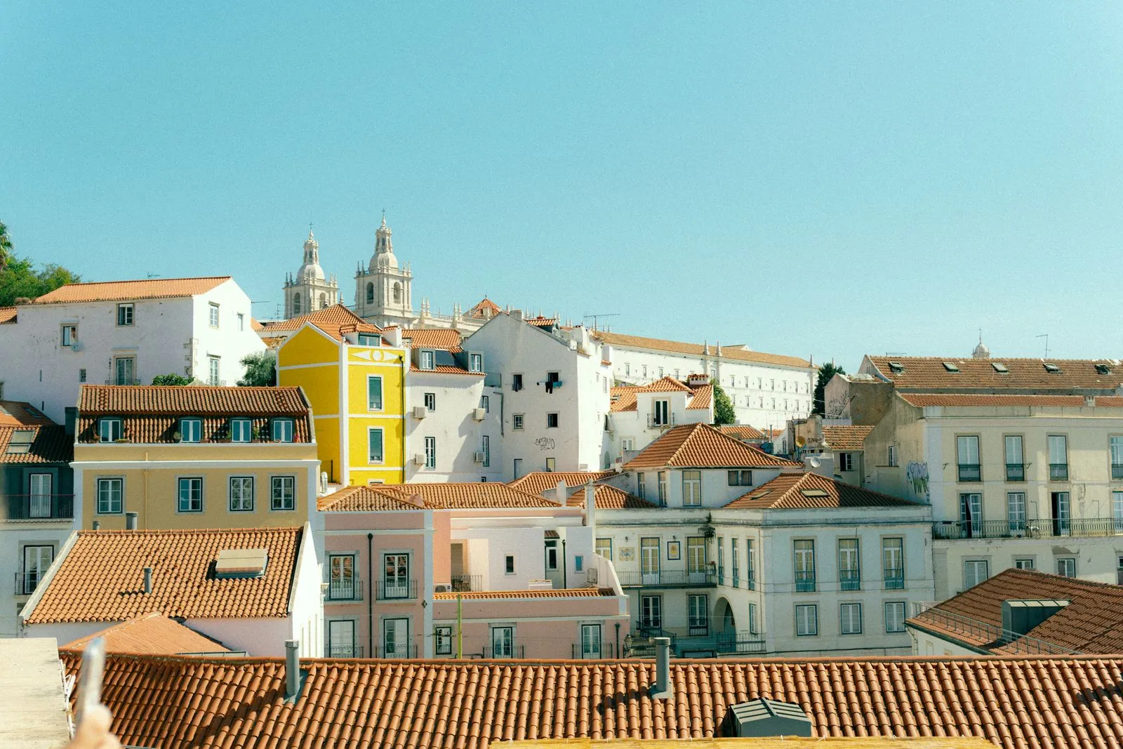 De architectuur van Alfama en Belém.